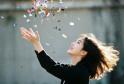 joyful-woman-celebrating-with-confetti (1)